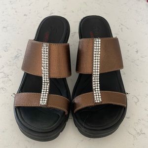 Skechers Black & bronze slip on sandals with front embellishment